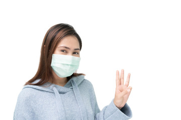Girl wearing mask again flu and covid-19,corona virus, put up three fingers