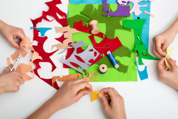 Flaps of colored fabric on the table. View from above