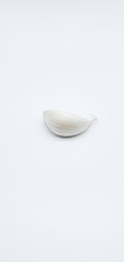 Garlic cloves are isolated on a white background.