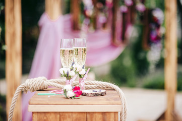 glasses at the wedding filled with champagne during the ceremony