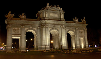 Fototapeta na wymiar Alcalá Door at night. Icon of Madrid city center.