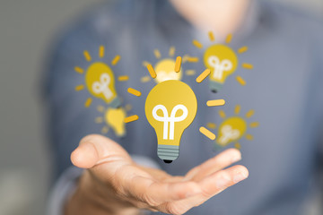 idea lamp concept in hand.
