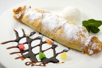 Strudel isolated on white background. Apple pie