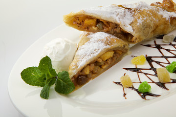 Strudel isolated on white background. Apple pie