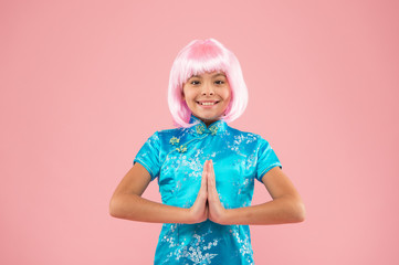Get peace of mind. Happy child do meditation holding hands in namaste. Meditation or prayer. Small...