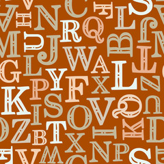 Seamless lettering pattern. Vintage beige latin letters on a brown background. School and learning theme. Decorative alphabet. Vector illustration