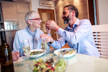 Senior couple enjoying at home