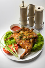 Roast chicken isolated on white background. Chicken tobacco