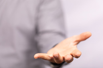 Fototapeta premium Businessman without head holding something without theme