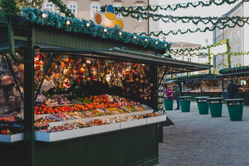 Christmas market stalls or christkindl markt, a typical sight ion austtia, full with different toys and other ornaments for a christmas tree.