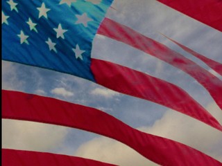 US flag and clouds 