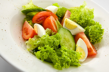 Appetizing salad isolated on white background