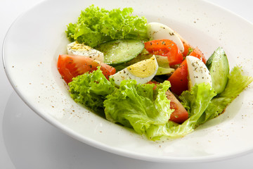 Appetizing salad isolated on white background