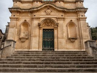 Fototapeta na wymiar Scicli cityscape. View to Historical Buildings. Sicily, Italy.