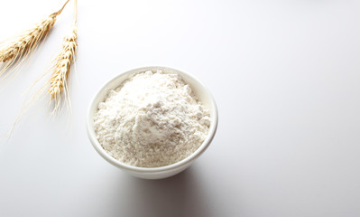 flour glass ears spikelets on a light background