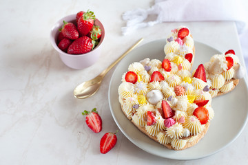 Bunny shaped tart for Easter with fresh strawberry