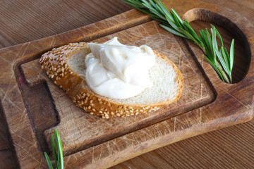 processed cheese bread on a wooden background