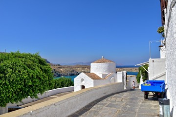 landscape from the historic city of lindos on the greek island of rhodes with white old tenement houses