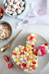 Bunny shaped tart for Easter with fresh strawberry