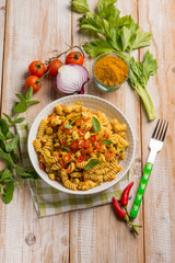 pasta with chicken ragout and curry spice