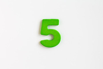 green painted wooden number five, craft sign for kid's education isolated, ecological concept