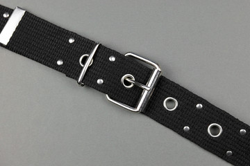 Fabric  belt on a grey background