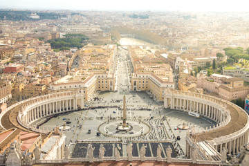 Aerial view of St Peter's square in Vatican City, Rome, Italy on a sunny autumn day with sunlight. Top view.
