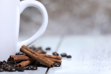 coffee beans,  cinnamon on a wooden table. Breakfast coffee. Morning. espresso