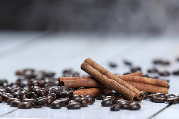 coffee beans,  cinnamon on a wooden table. Breakfast coffee. Morning. espresso