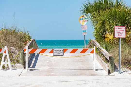 Beaches closed with barriers