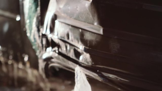 Detail of the vehicle crashing down losing fuel during the accident. 