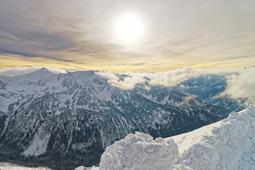 Fototapeta premium Sunset at Kasprowy Wierch of Zakopane in Tatra Mounts in winter
