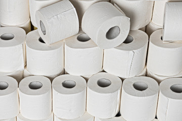 Toilet paper rools stacked on top of each other