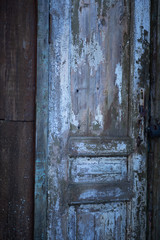 old door as background, cracked old paint on a wooden surface