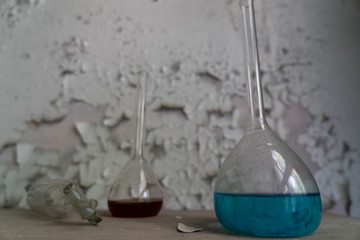 Vintage equipment of chemical laboratory on wooden table