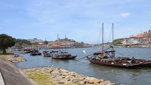 City of Porto seen from Vila Nova de Gaia with the traditional boats with wine port barrels, Portugal