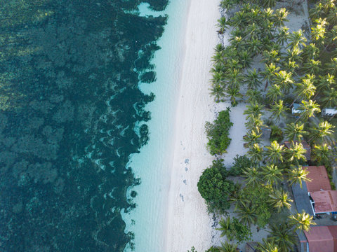 Aerial top down view of Algeria Beach on a tropical paradise island of Siargao, Philippines © Aleksandr