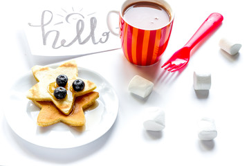 concept kid breakfast with pancake on white background