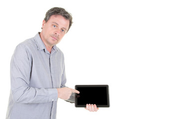 Smiling man demonstrating showing blank tablet computer black screen aside copy space