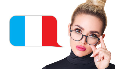 Blonde woman in glasses near dialogue frame with french flag.