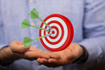 dart target arrow hitting on bullseye which is the ultimate goal that everyone wants.