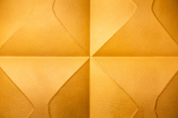 Abstract geometric background in pleasant yellow, orange. Ceiling panels.