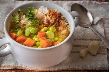Vegan lima beans, carrot and rice soup