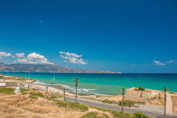 Heraklion city, beach view. Central street of Heraklion with sea and sky.