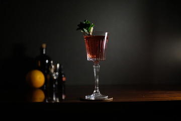 Manhattan red delitious cocktail with mint