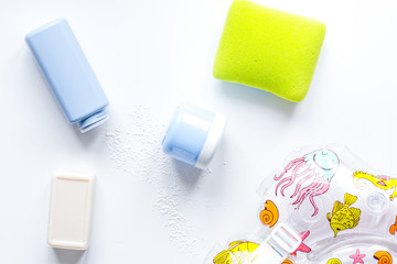 baby accessories for bath with duck on white background