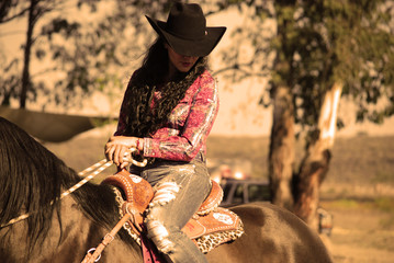 young woman on a horse 