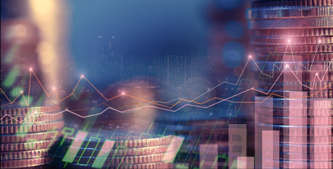 Financial investment concept, Double exposure of city night and stack of coins for finance investor, Forex trading candlestick chart, Cryptocurrency  Digital economy. background for invest