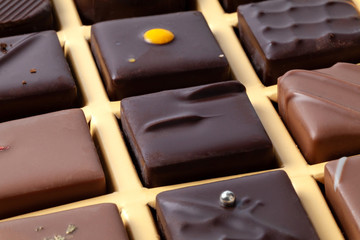 Natural chocolate candies in a beautiful cardboard box.