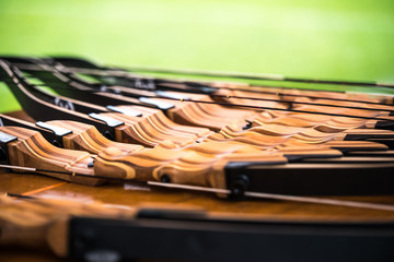 many bows on table with green blurry background